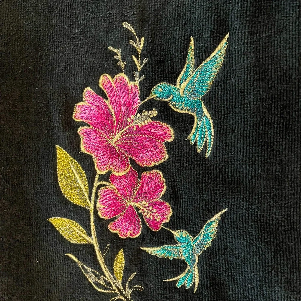 Handcrafted floral hummingbird/butterfly theme embroidered pair of hand towels.